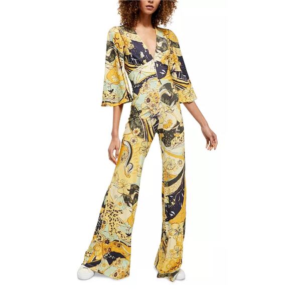 Free People Retro Night Fever Wide Leg Deep V-Neck Jumpsuit Size Medium - Picture 1 of 12